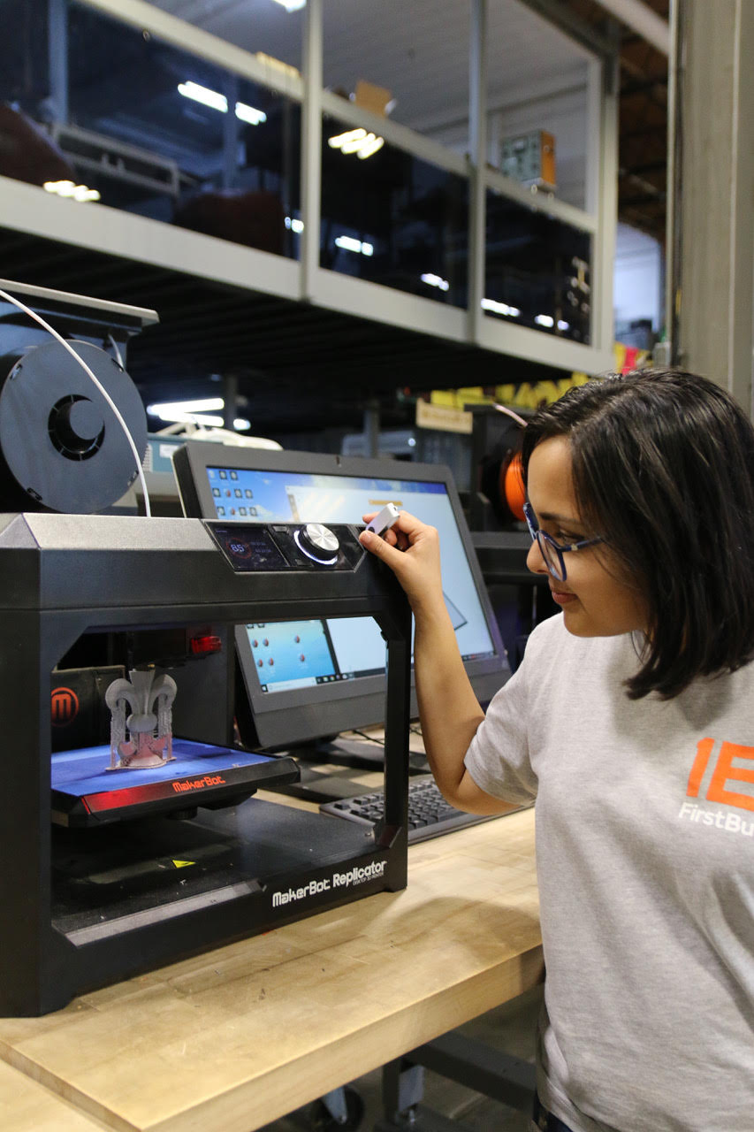 Woman operating machinery.