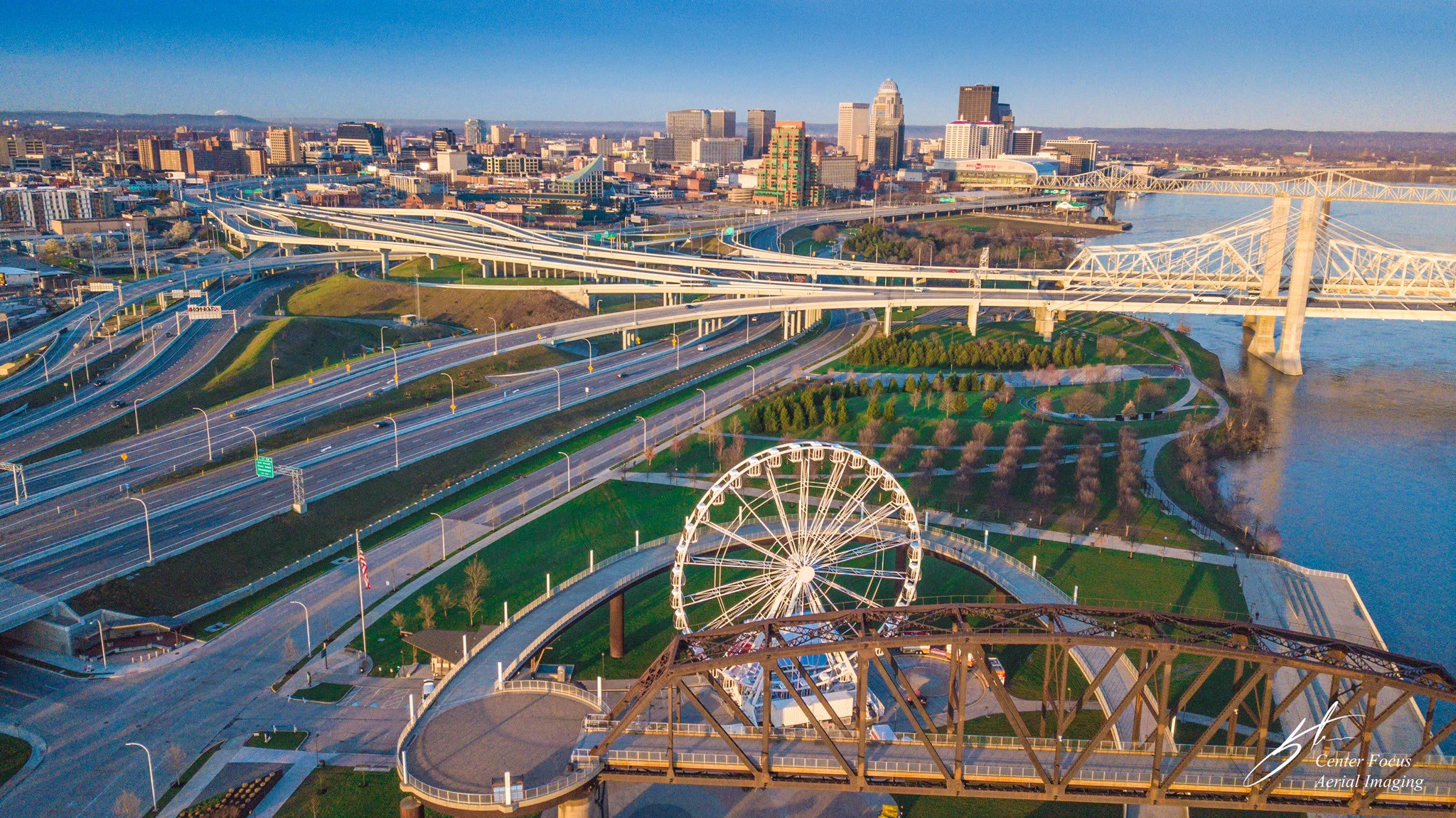 Louisville highways behind a ferris wheel.